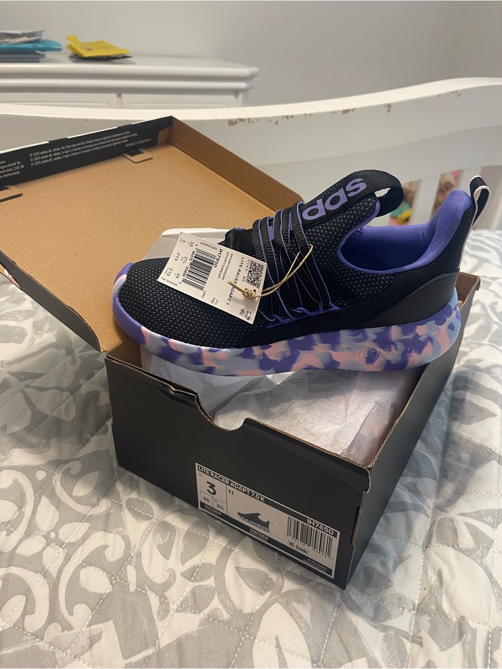 AdidasBlack and Purple Kids Slip-On Athletic Shoe with Patterned Midsole